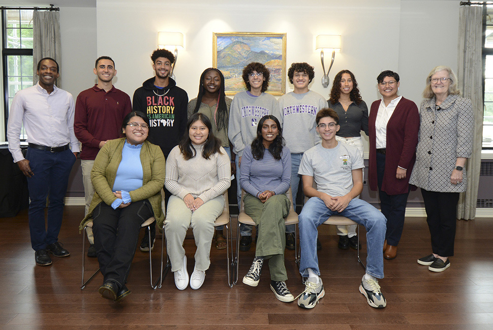 Alumni standing together for a photo 
