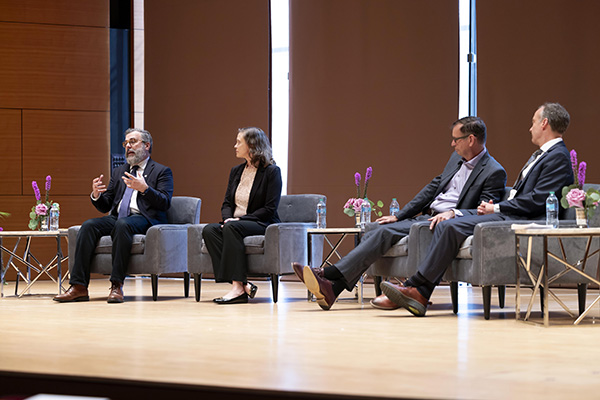 Faculty members on stage